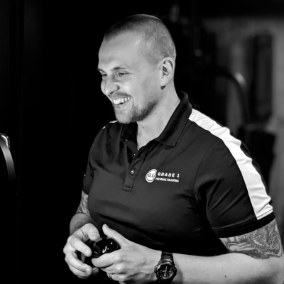 Close up photo of Coach Joss conducting an Online personal training session